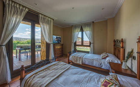 Bedroom with doors to terrace